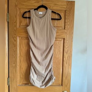 Never worn! Mini dress with side gathering.